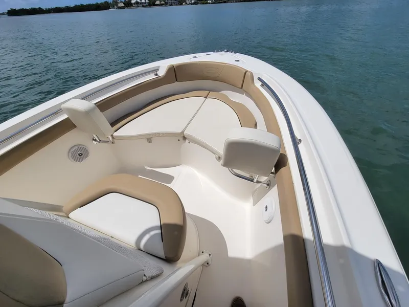 Slide: The Image of Interior view of a 2016 Pioneer 197 Islander boat on the water. - 6