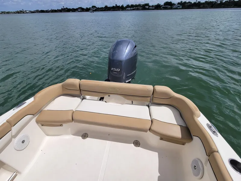 Slide: The Image of Pioneer 197 Islander 2016 boat with outboard motor on calm water. - 8