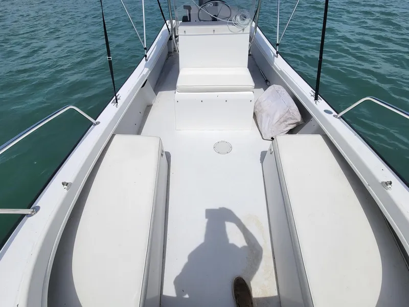 Slide: The Image of Interior view of a 2007 Eastern 20CC boat on the water. - 6
