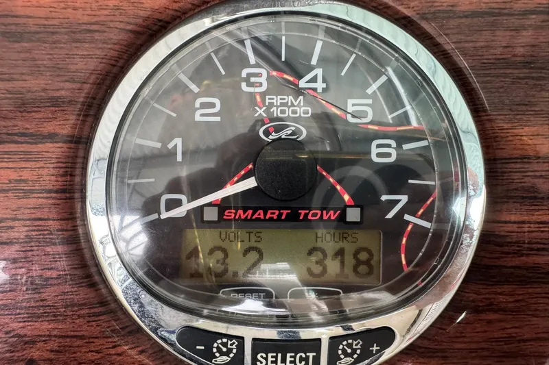 Slide: The Image of Tachometer of 2008 Sea Ray 240 Sundeck showing 318 hours and 13.2 volts. - 19