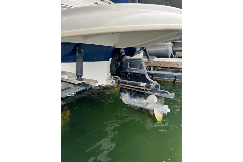 Slide: The Image of 2008 Sea Ray 240 Sundeck boat with MerCruiser outdrive in water. - 7
