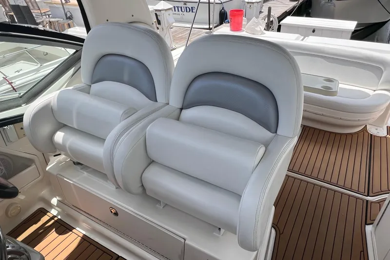 Slide: The Image of Luxury seating on 2003 Sea Ray 340 Sundancer boat with teak flooring. - 9