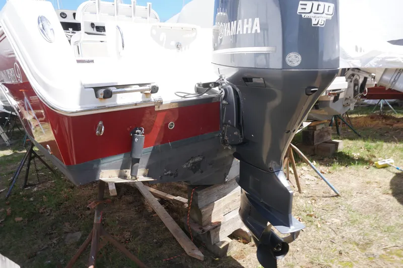 Slide: The Image of 2012 Sailfish 2380 CC boat with Yamaha 300 V6 engine on dry dock. - 25