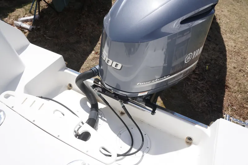 Slide: The Image of 2012 Sailfish 2380 CC boat with Yamaha 300 outboard motor, rear view. - 8