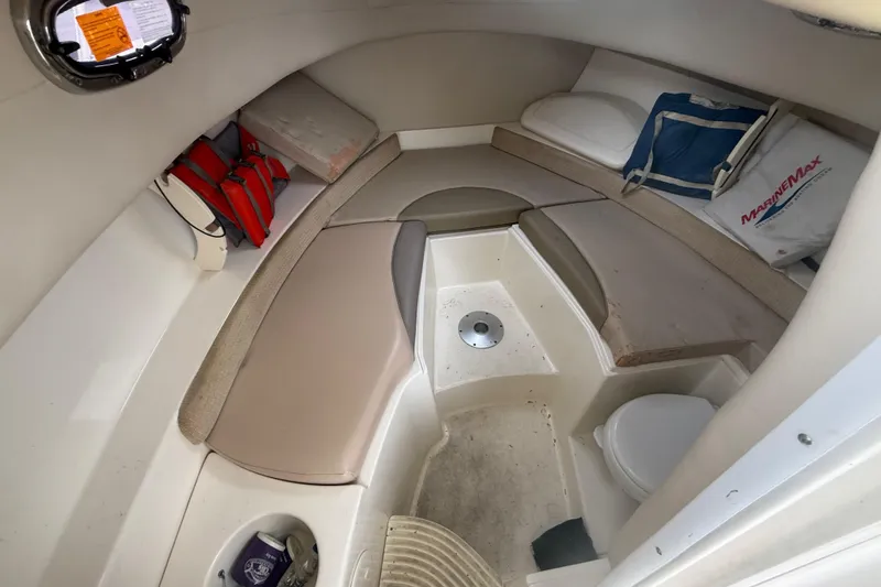 Slide: The Image of Interior cabin of 2012 Boston Whaler 255 Conquest boat with seating and storage. - 30
