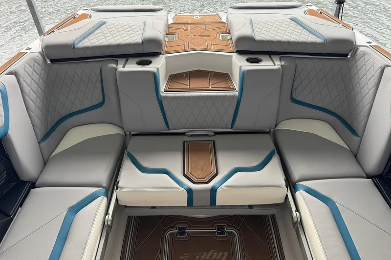 Slide: The Image of 2023 Tigé 25ZX boat interior with luxurious seating and stylish design. - 20