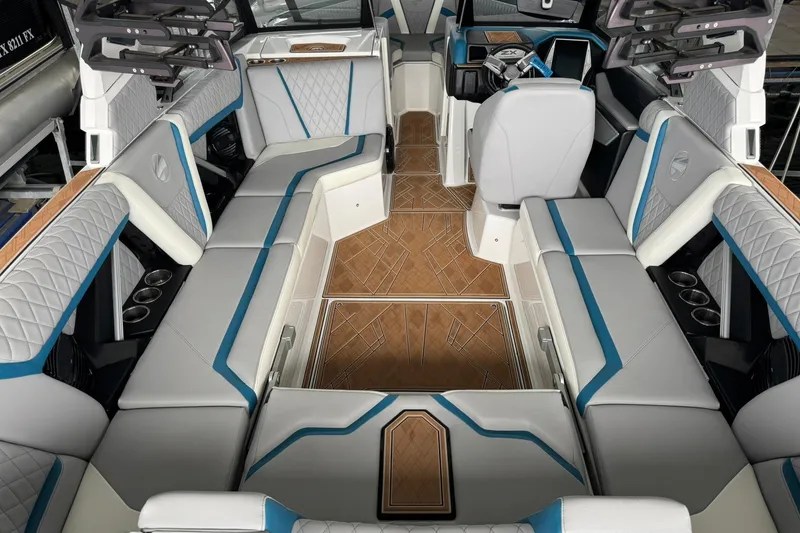 Slide: The Image of Luxurious interior of 2023 Tigé 25ZX boat with stylish seating and modern design. - 21