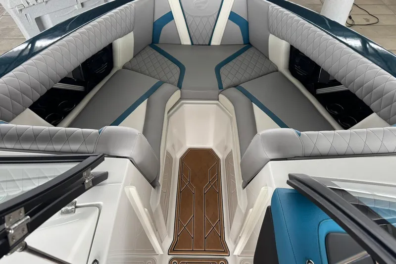 Slide: The Image of 2023 Tigé 25ZX boat interior with luxurious seating and stylish design. - 32