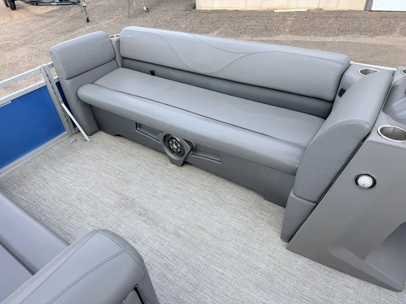 Slide: The Image of 2022 Tahoe Sport 2080 CRB boat with gray seating and speaker. - 14