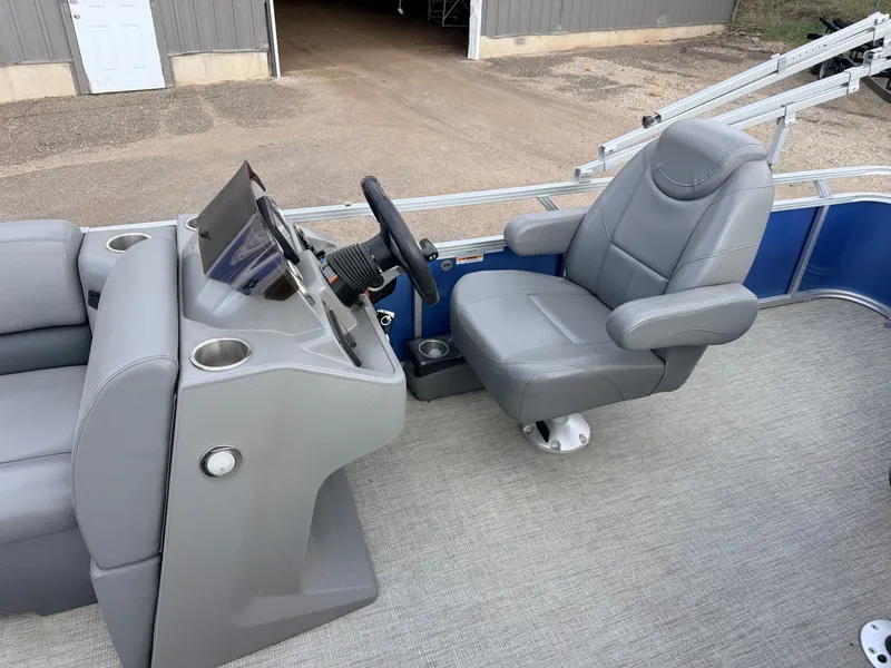 Slide: The Image of Interior of 2022 Tahoe Sport 2080 CRB boat with gray seating. - 16