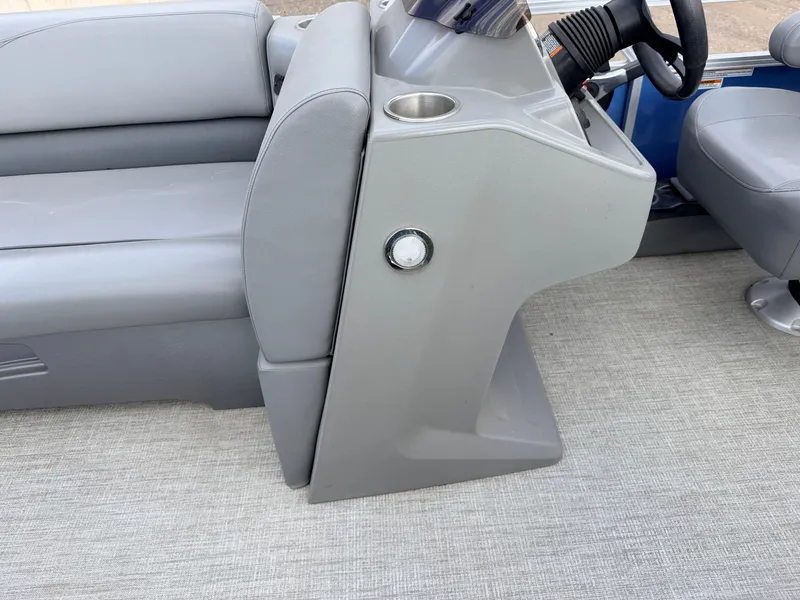 Slide: The Image of Interior of 2022 Tahoe Sport 2080 CRB boat with gray seating. - 17