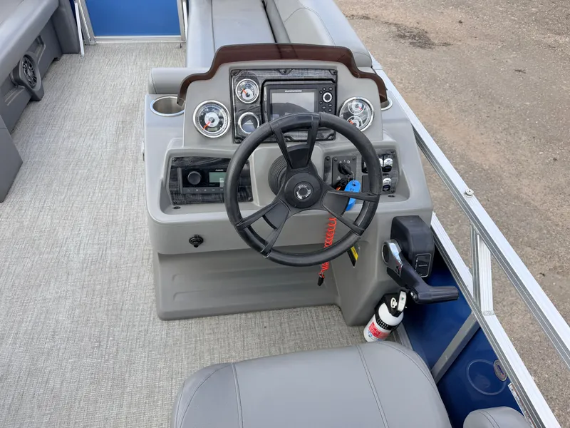 Slide: The Image of Steering console of a 2022 Tahoe Sport 2080 CRB boat. - 19