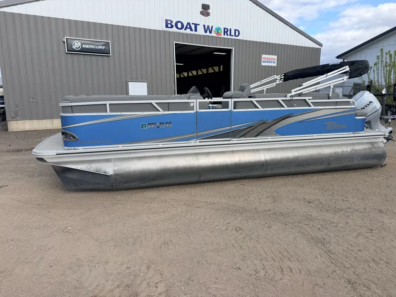 Slide: The Image of 2022 Tahoe Sport 2080 CRB boat outside Boat World building. - 24