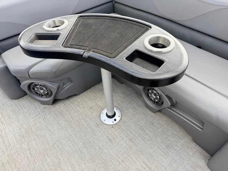 Slide: The Image of Interior of 2022 Tahoe Sport 2080 CRB with table and speakers. - 30