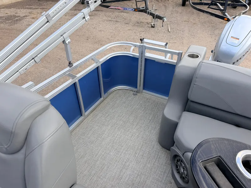 Slide: The Image of Interior of a 2022 Tahoe Sport 2080 CRB boat with gray seating. - 32