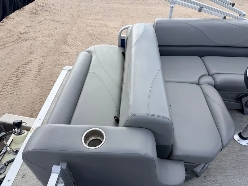 Slide: The Image of 2022 Tahoe Sport 2080 CRB boat with gray leather seats. - 34
