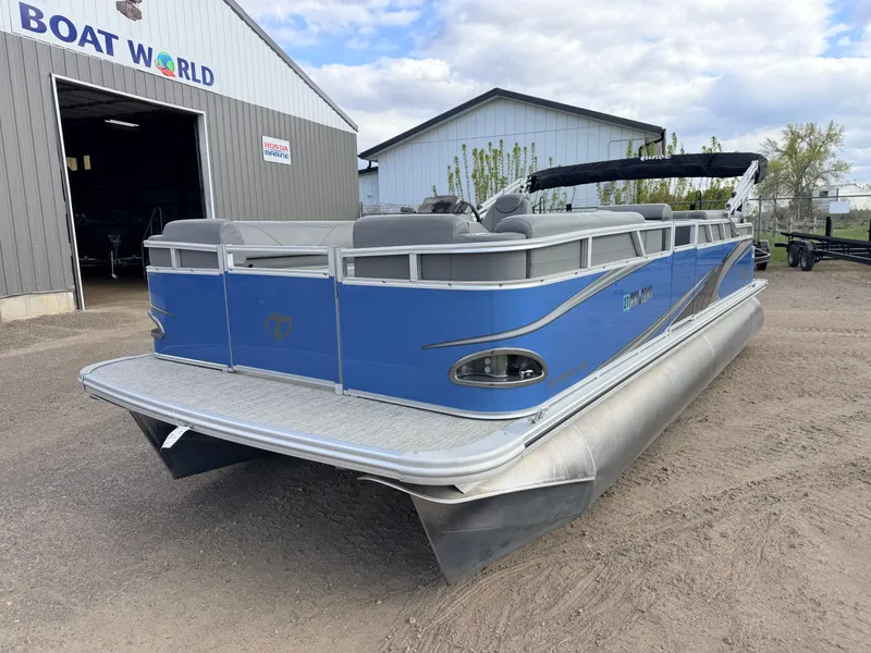 Slide: The Image of 2022 Tahoe Sport 2080 CRB boat outside Boat World building. - 37
