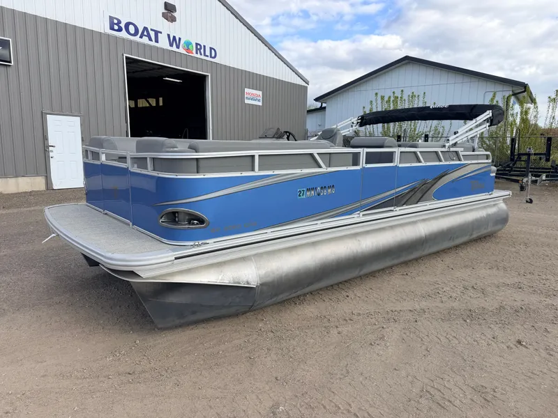 Slide: The Image of 2022 Tahoe Sport 2080 CRB pontoon boat outside Boat World building. - 39