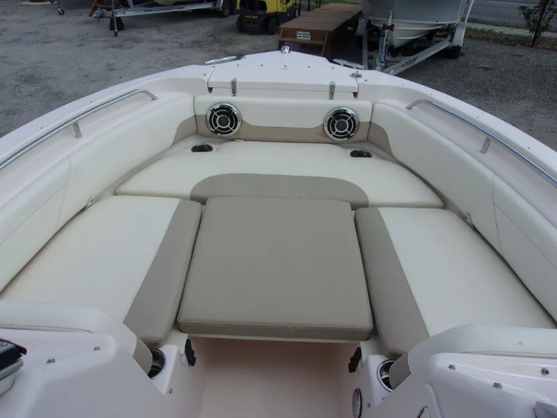 Slide: The Image of Interior of a 2014 Grady-White Freedom 225 boat with seating area. - 11