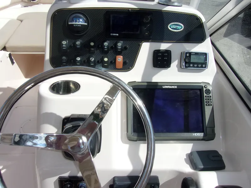 Slide: The Image of Dashboard of a 2014 Grady-White Freedom 225 boat. - 6