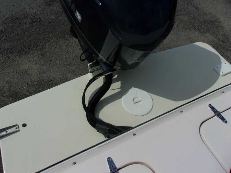 Slide: The Image of 2014 Grady-White Freedom 225 boat motor and deck view. - 8
