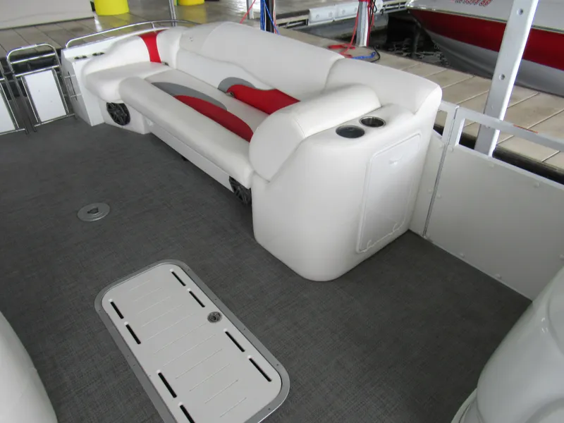 Slide: The Image of Interior of a 2014 JC Sporttoon 26TT pontoon boat with gray flooring. - 12