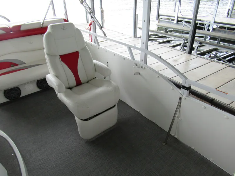 Slide: The Image of Interior of a 2014 JC Sporttoon 26TT with white seating. - 17