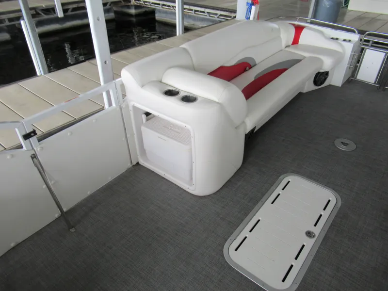 Slide: The Image of Interior of a 2014 JC Sporttoon 26TT with seating and storage. - 19