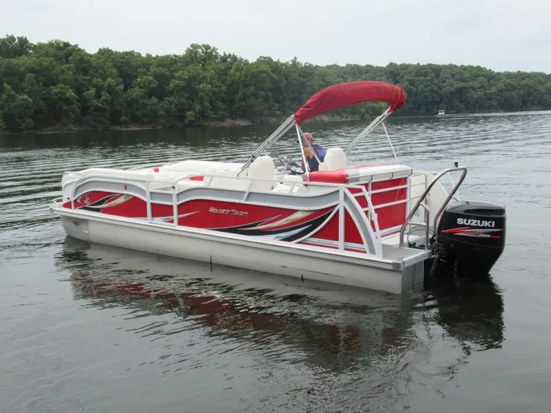 Slide: The Image of 2014 JC Sporttoon 26TT pontoon boat on calm lake. - 6