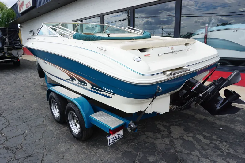 Slide: The Image of Close-up of 1998 Sea Ray 210 Signature boat logo. - 2