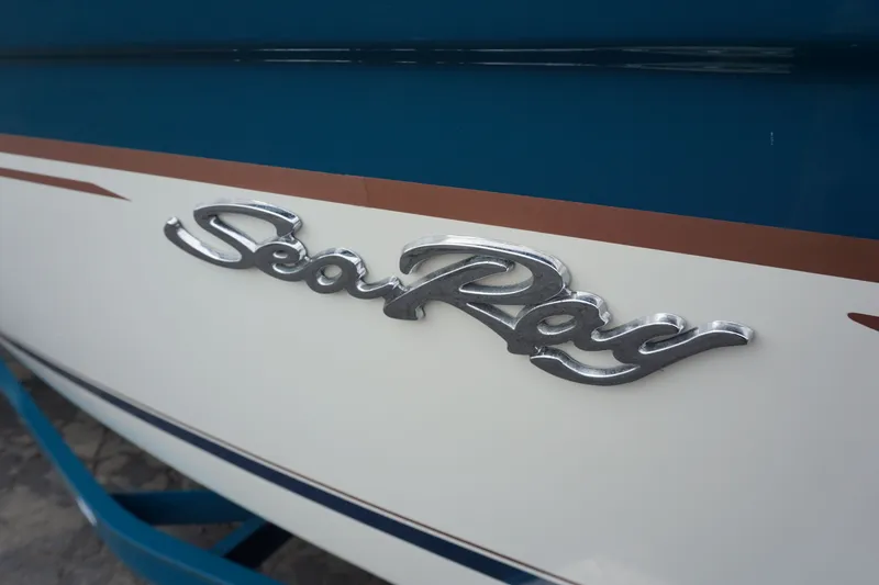 Slide: The Image of Close-up of 1998 Sea Ray 210 Signature boat logo. - 3