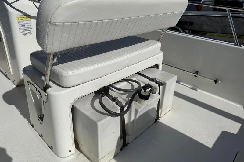 Slide: The Image of 2015 Boston Whaler 170 Montauk boat seat with fuel tank underneath. - 16