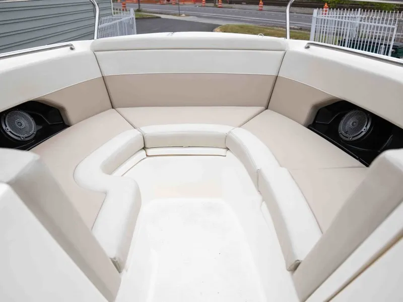 Slide: The Image of Interior of 2022 Boston Whaler 240 Vantage with beige seating. - 13