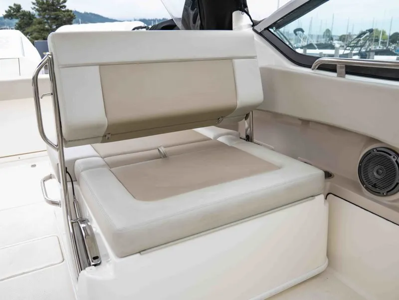 Slide: The Image of Interior of 2022 Boston Whaler 240 Vantage with beige seating. - 17