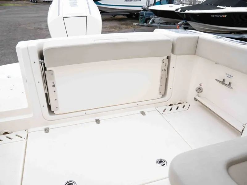 Slide: The Image of Boston Whaler 240 Vantage 2022, interior view of rear seating area. - 19