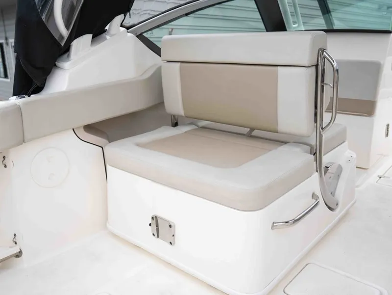 Slide: The Image of Interior of 2022 Boston Whaler 240 Vantage with beige seating. - 8