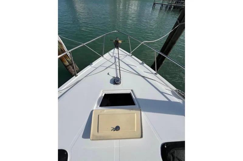 Slide: The Image of Bow view of 2008 ProKat 3660 Sport Fish boat on calm water. - 18