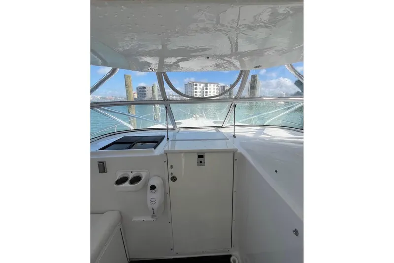 Slide: The Image of 2008 ProKat 3660 Sport Fish boat interior with ocean view through windshield. - 9