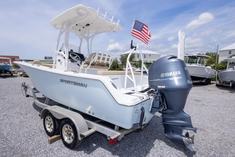 Slide: The Image of 2015 Sportsman Heritage 211 Center Console boat with Yamaha engine on trailer. - 12