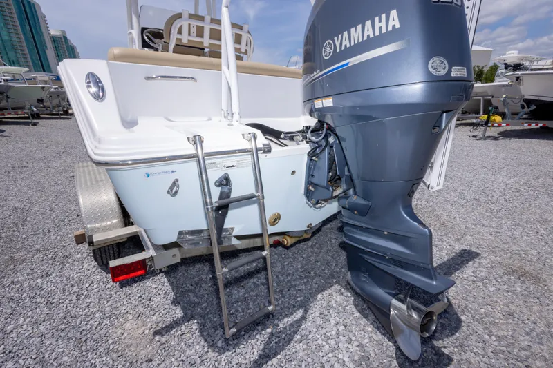 Slide: The Image of 2015 Sportsman Heritage 211 Center Console with Yamaha outboard motor and ladder. - 41