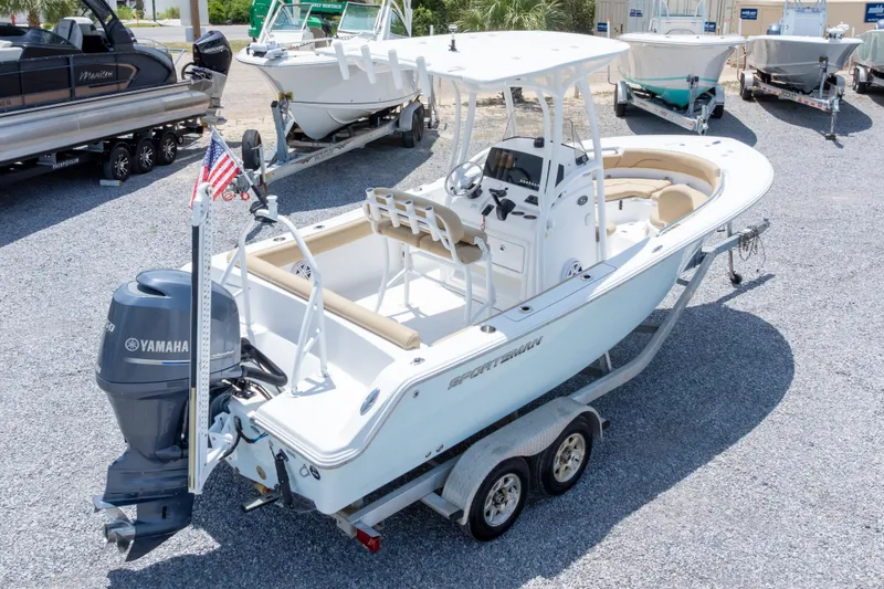 Slide: The Image of 2015 Sportsman Heritage 211 Center Console boat on trailer with Yamaha outboard motor. - 42