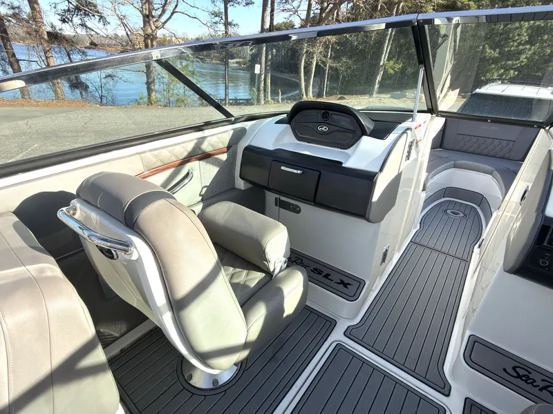 Slide: The Image of Interior of a 2008 Sea Ray 270 SLX boat with gray seating. - 11