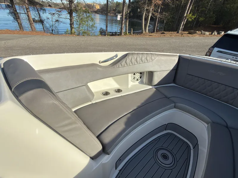 Slide: The Image of Interior of a 2008 Sea Ray 270 SLX boat with gray upholstery. - 12