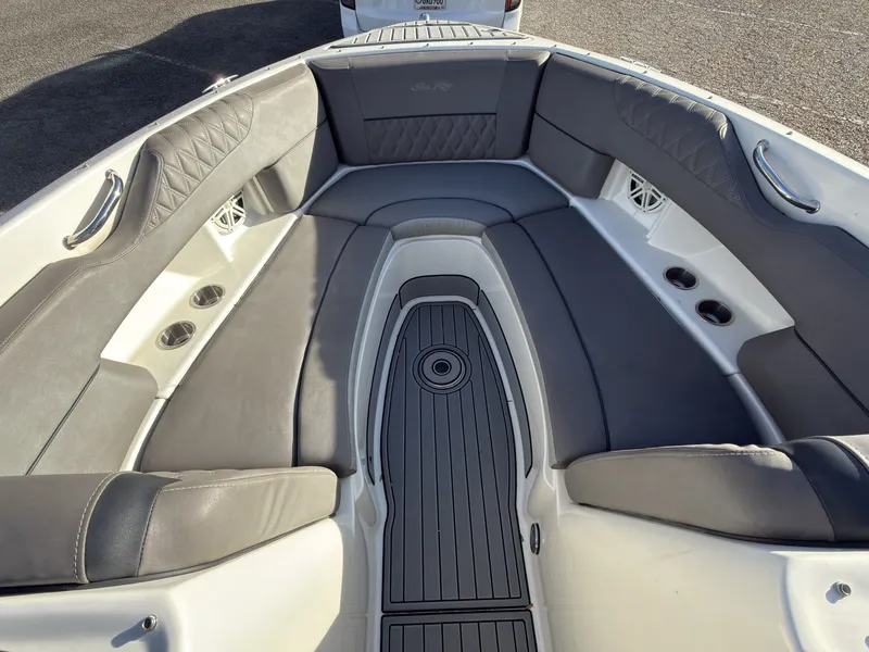 Slide: The Image of Interior of a 2008 Sea Ray 270 SLX boat with gray upholstery. - 14