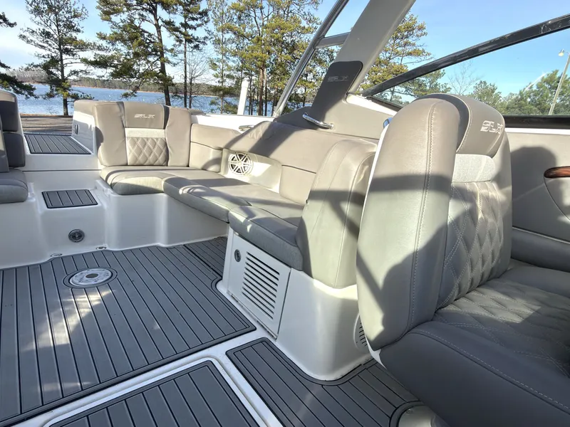 Slide: The Image of Interior of a 2008 Sea Ray 270 SLX with gray leather seating. - 18