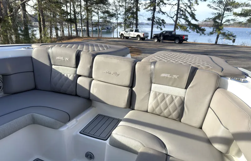 Slide: The Image of Interior of a 2008 Sea Ray 270 SLX with gray upholstery. - 21