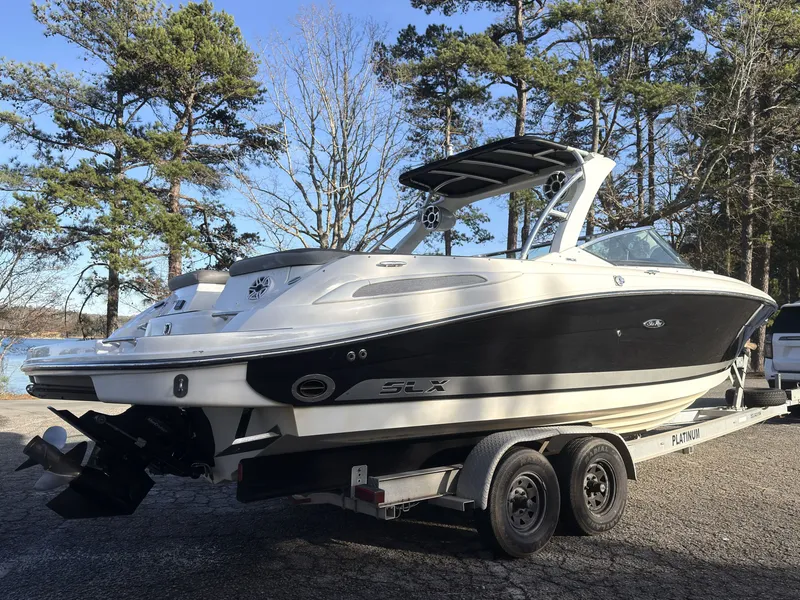 Slide: The Image of 2008 Sea Ray 270 SLX boat on trailer outdoors. - 3