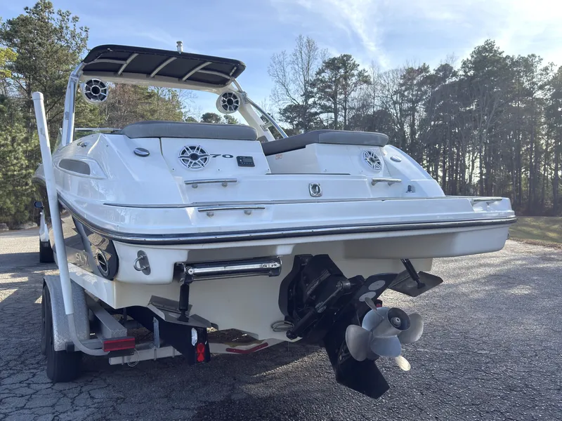 Slide: The Image of Rear view of a 2008 Sea Ray 270 SLX boat on a trailer. - 5