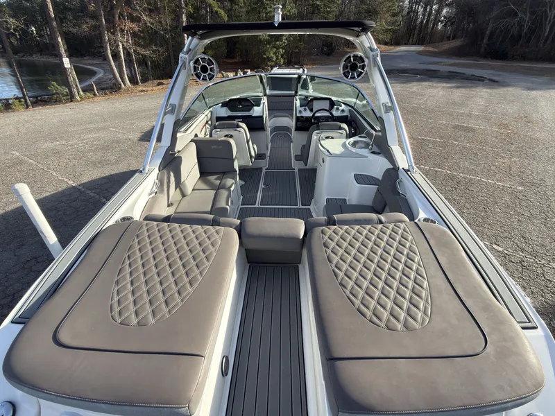 Slide: The Image of Interior view of a 2008 Sea Ray 270 SLX boat with luxurious seating. - 7