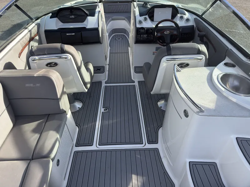 Slide: The Image of Interior of a 2008 Sea Ray 270 SLX boat with gray seating. - 8